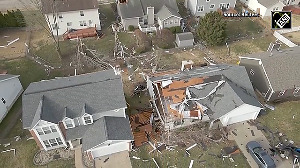 Massive storm devastates US, series of Tornadoes rake destruction, kill 13