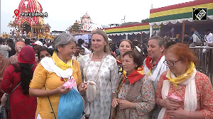 Devotees from Kyrgyzstan attend Lord Jagannath's Rath Yatra in Puri