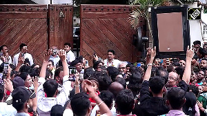 Amitabh Bachchan warmly greets fans outside his Mumbai residence