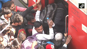 Devotees gather in large numbers to board train to Prayagraj for Maha Kumbh