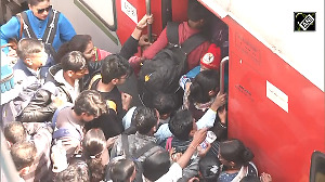 Devotees gather in large numbers to board train to Prayagraj for Maha Kumbh