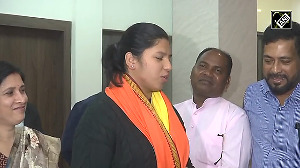 BJP leader Suvendu Adikhari meets Indian Cricketer Richa Ghosh at her residence
