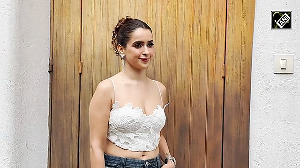 Sanya Malhotra looked very stylish in a short white top and fashionable jeans