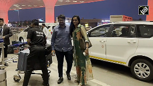 Newly-married PV Sindhu spotted with husband Venkata Datta Sai at Mumbai Airport poses for cameras