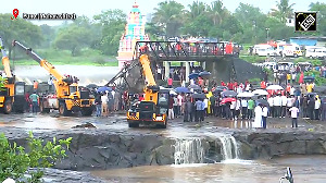 Scenes from Pune bridge collapse site, search and rescue operation underway