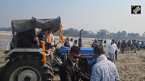 Assam CM drives tractor, celebrates Bhogali Bihu with farmers