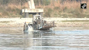 Yamuna Cleaning drive underway near Vasudev Ghat in New Delhi