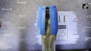 Rakhi Sawant Stuns in 'Blue Drum' Entry at Event 