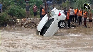 Car swept away in J-K's Kathua, rescued with crane 