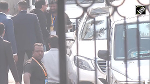SRK leaves the Hyatt Regency hotel after meeting Lionel Messi