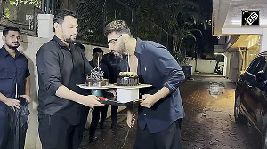 Arjun Kapoor celebrates birthday by cutting a cake with the paps