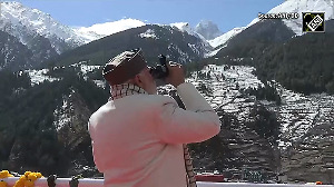 PM Modi puts on binoculars, enjoys beauty of snow-capped mountains in Mukhwa, Uttarakhand