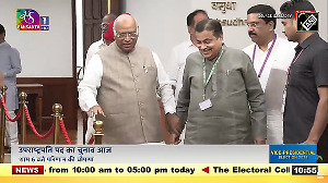 V-P election: Gadkari, Kharge arrive hand-in-hand to cast vote 