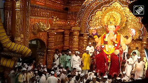 Visarjan procession of Lalbaugcha Raja begins with colours, dhol beats