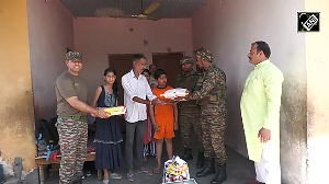 Indian Army jawans go door-to-door with ration in shelling-affected areas