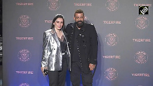 Sanjay Dutt poses for the paps with wife Maanayata Dutt