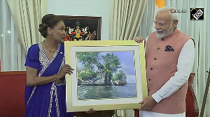 PM Modi presents holy water of Sangam, Saryu from MahaKumbh, a replica of Ram Mandir to T&T PM Kamla