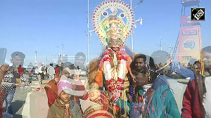 Prayagraj Man dressed up as Lord Hanuman steals limelight in Maha Kumbh 2025