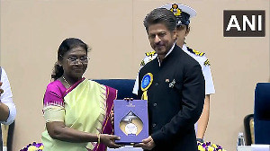 President Murmu confers Shah Rukh Khan with the National Film Award for the Best Actor in a Leading Role for his film 'Jawan'