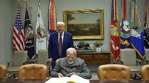 Trump hugs Modi