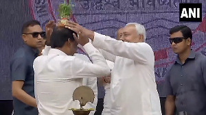 Watch: Nitish Kumar places flowerpot on bureaucrat's head 