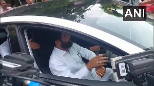 Watch: Eknath Shinde drives Tesla outside Vidhan Bhavan in Mumbai