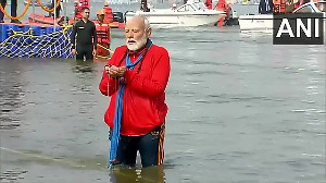 Modi takes holy dip in Sangam at Mahakumbh