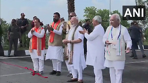 PM Modi inaugurates key bridge in Bihar, waves his stole at crowd