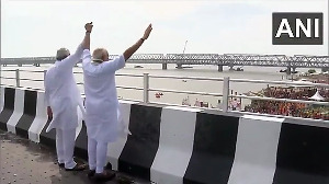 PM Modi inaugurates key bridge in Bihar, waves his stole at crowd