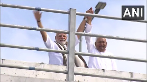 PM Modi inaugurates key bridge in Bihar, waves his stole at crowd